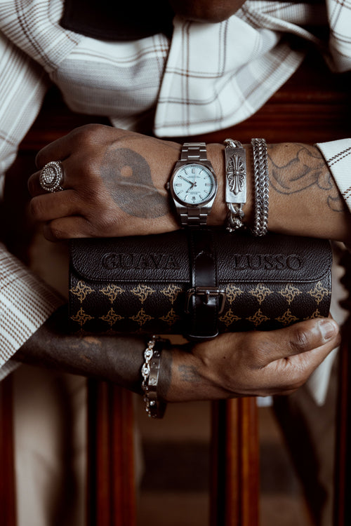 Handcrafted brown leather 3-slot watch case by Guava Lusso with brass hardware